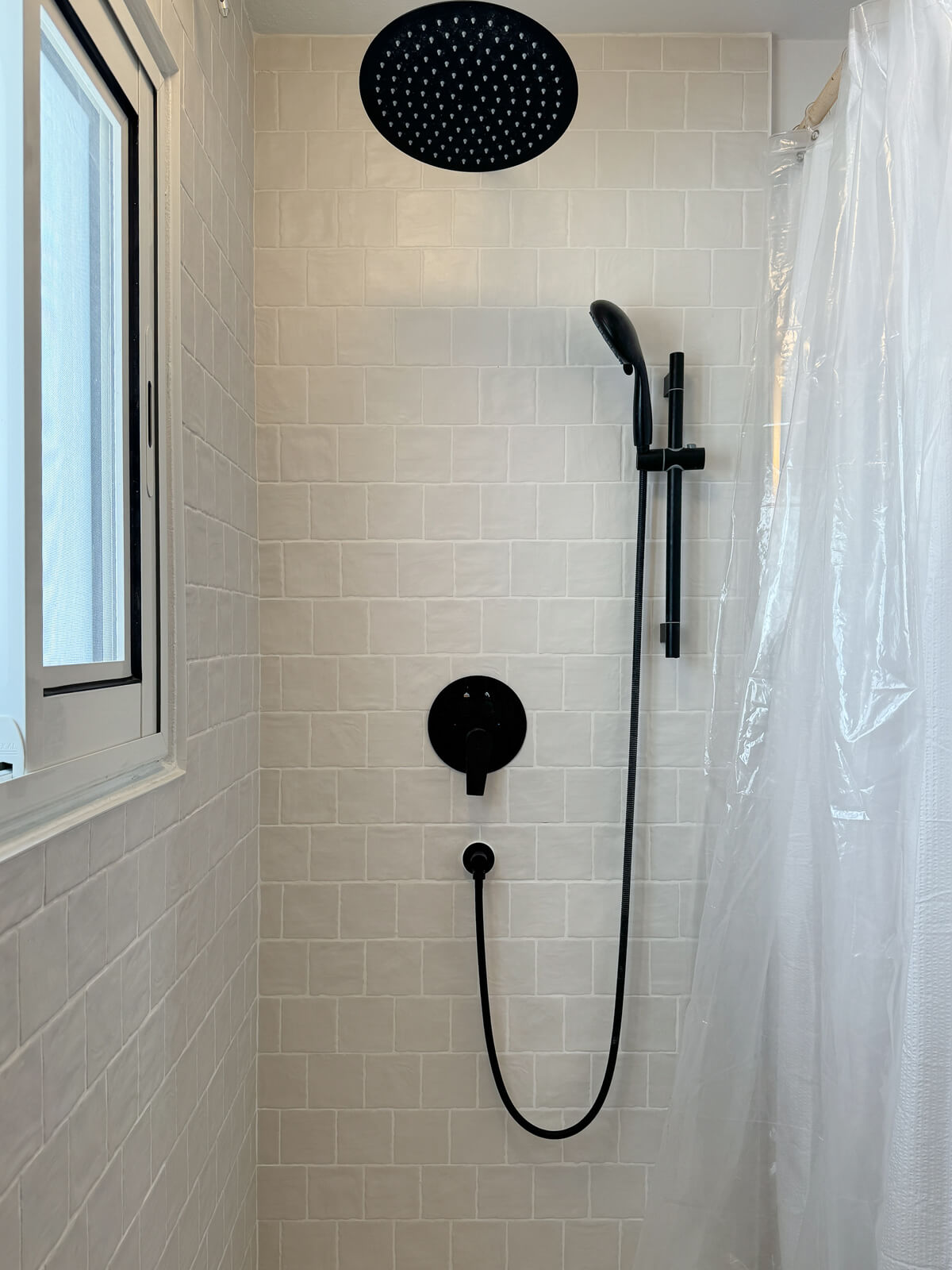 Downstairs bathroom detail — guest amenities and plush towels