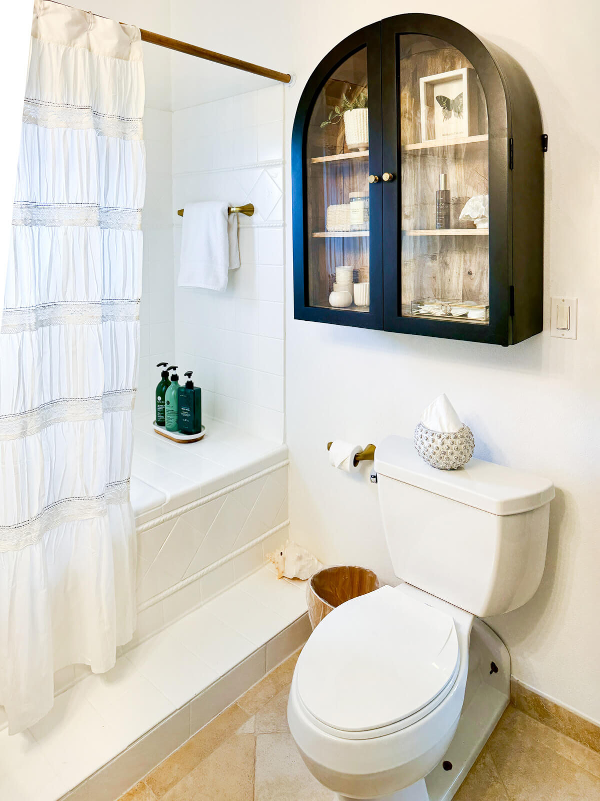 Jack & Jill bathroom — vaulted ceiling, tub and shower combination, spacious vanity