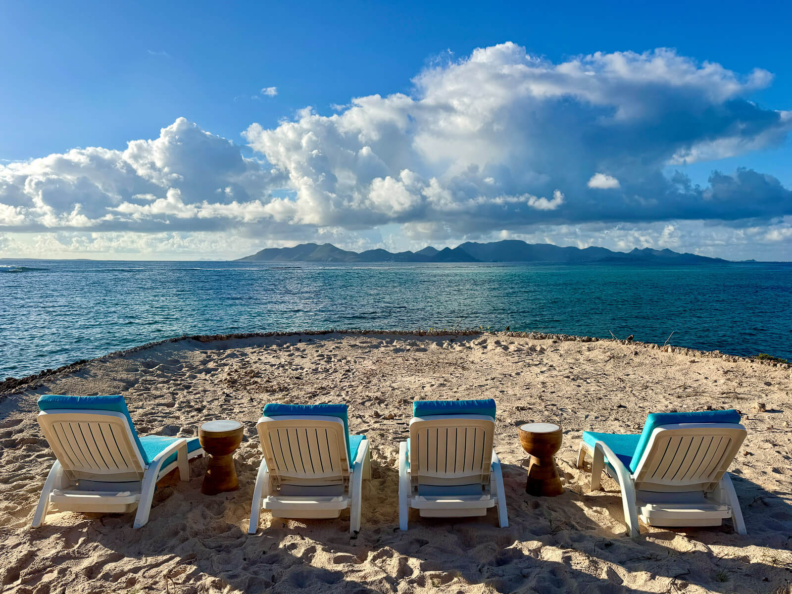 The Point — sunlit afternoon, nothing but water and sky ahead