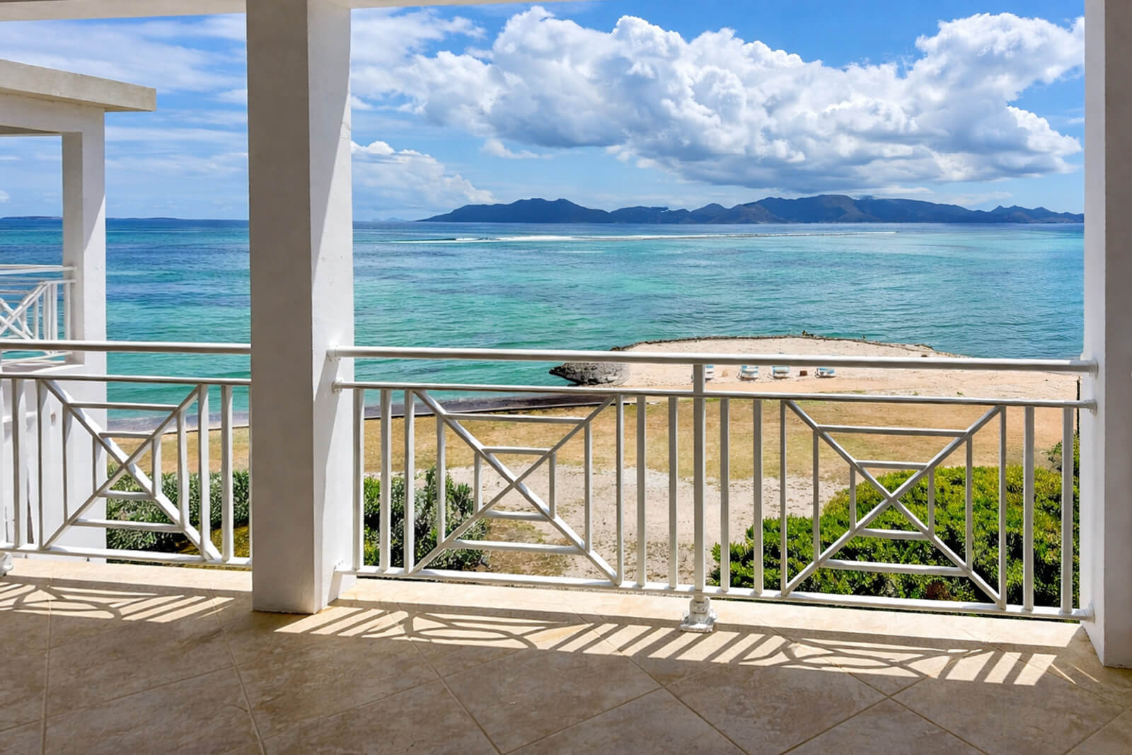 Upper Patio — lounge seating and sea views
